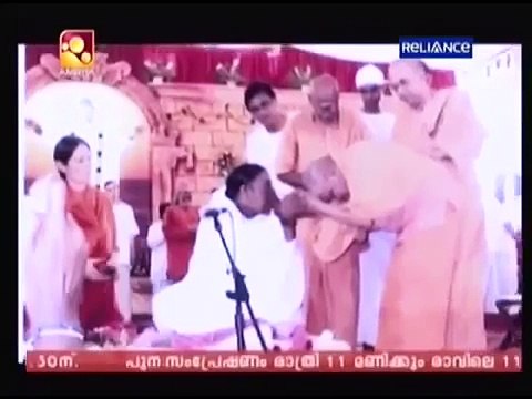 Swami Mridananda (Sri Ramakrishna Ashram) and Mata Amritanandamayi