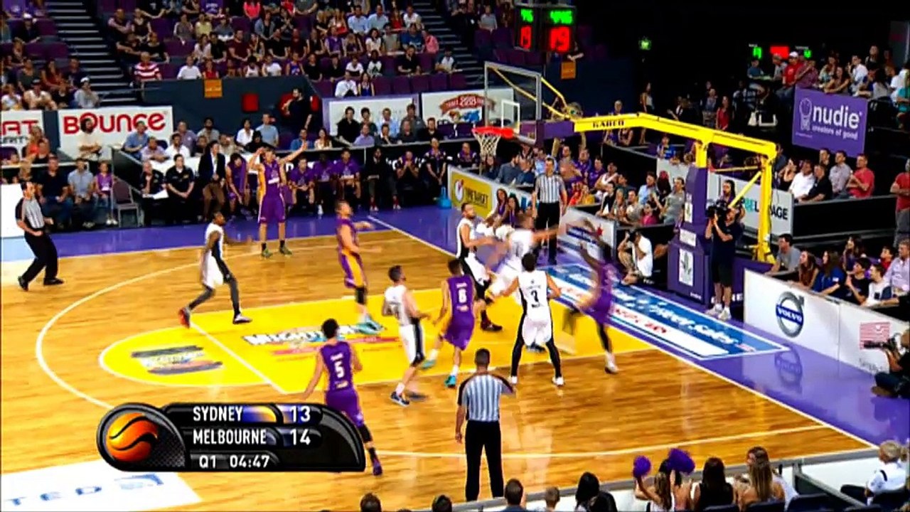 Sydney Kings player stumbles over a photographer