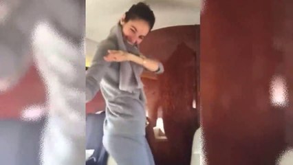 Beautiful Girl Dancing on Airplane Up in the Air
