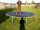 Drunk man jumping on a trampoline