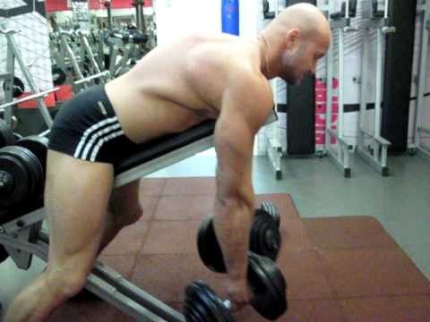 Как накачать спину - №117. Шраги лежа на животе на наклонной скамье