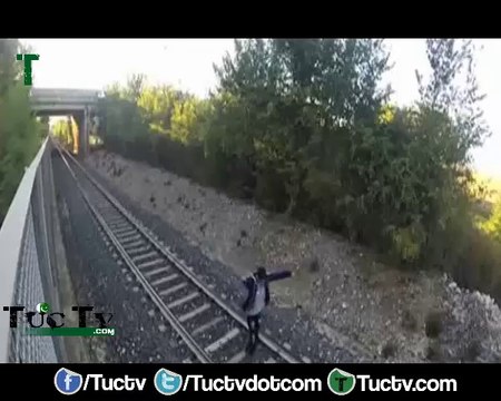 Italian teen lays between tracks and lets speeding train race over