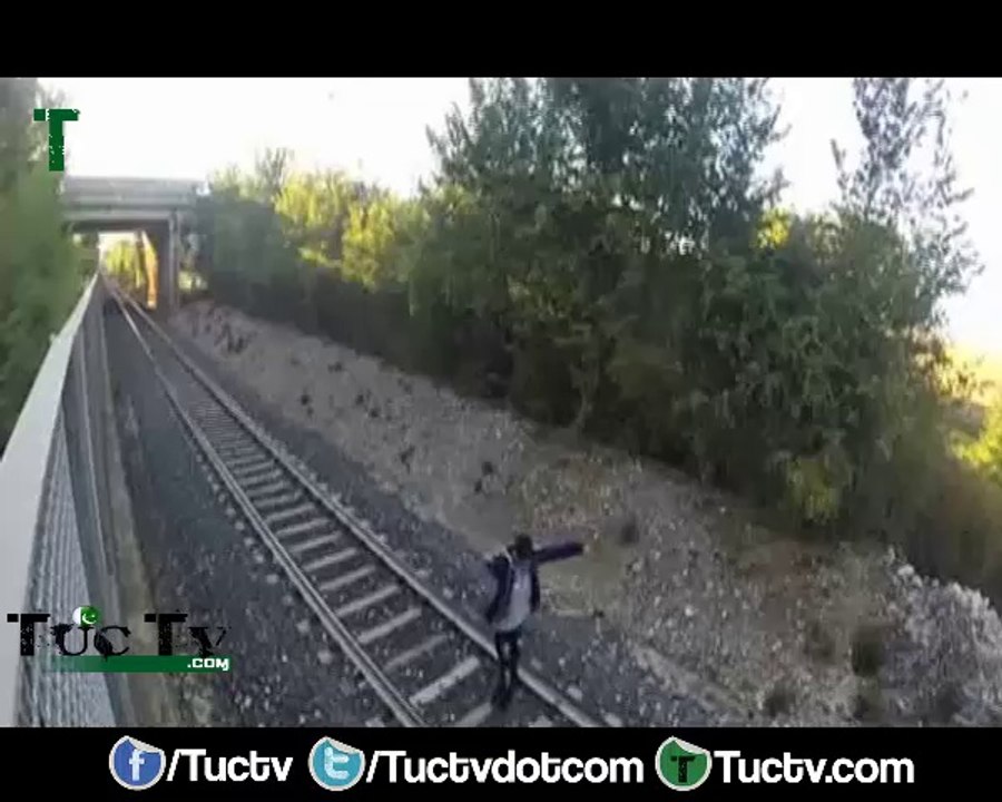 Italian teen lays between tracks and lets speeding train race over