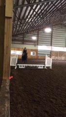 Kimberly riding Indigo at hunter jumper competition at Cornerstone Stables in Oregon