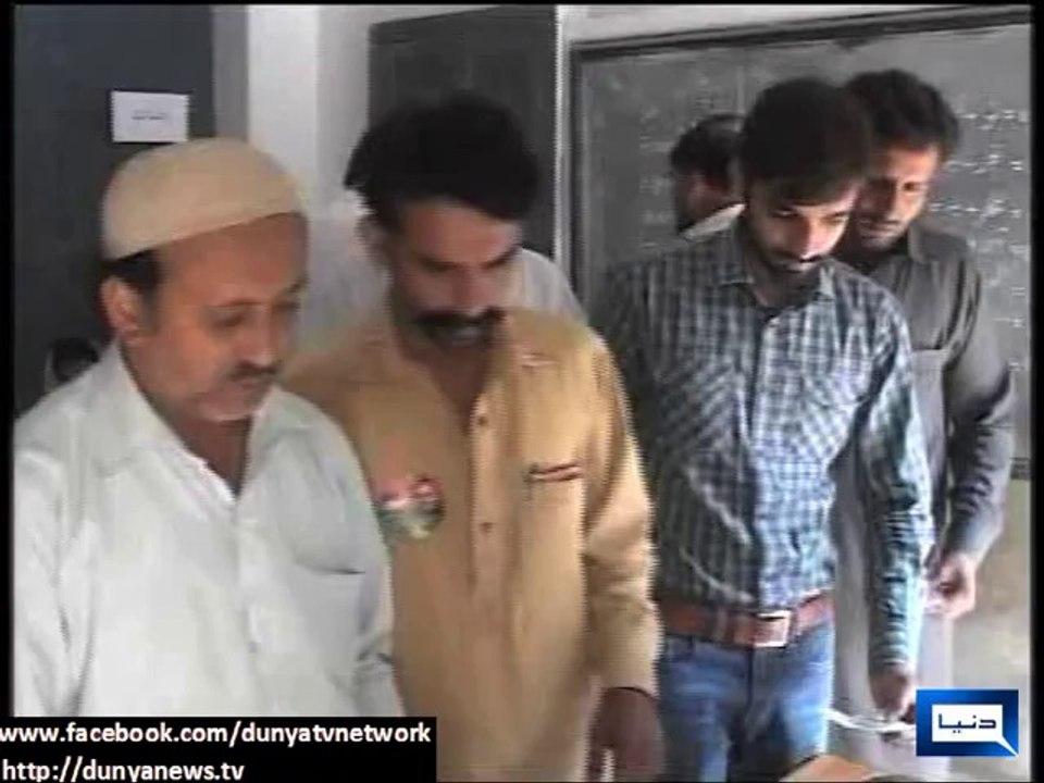 NA-149 by-polls Voters cast vote after showing it to polling agents