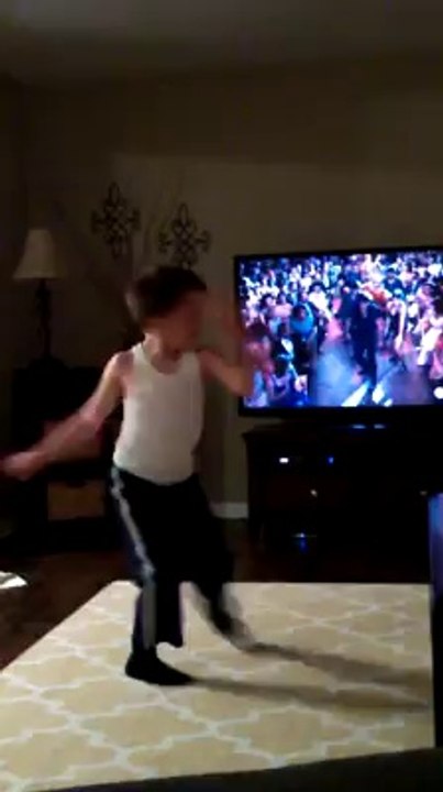 Young boy dancing like Patrick Swayze in Dirty Dancing