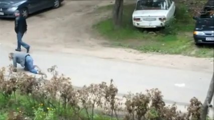 Drunk woman crawls in the street