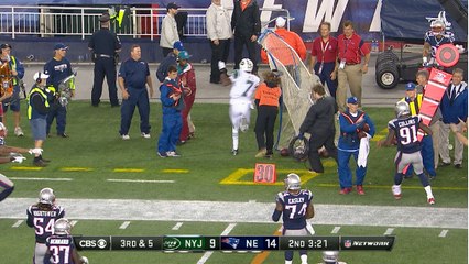 Geno Smith runs over security guard