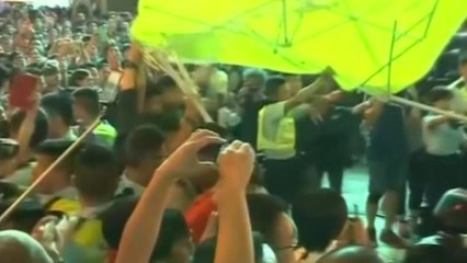 Pro-democracy protesters regroup, clash with police