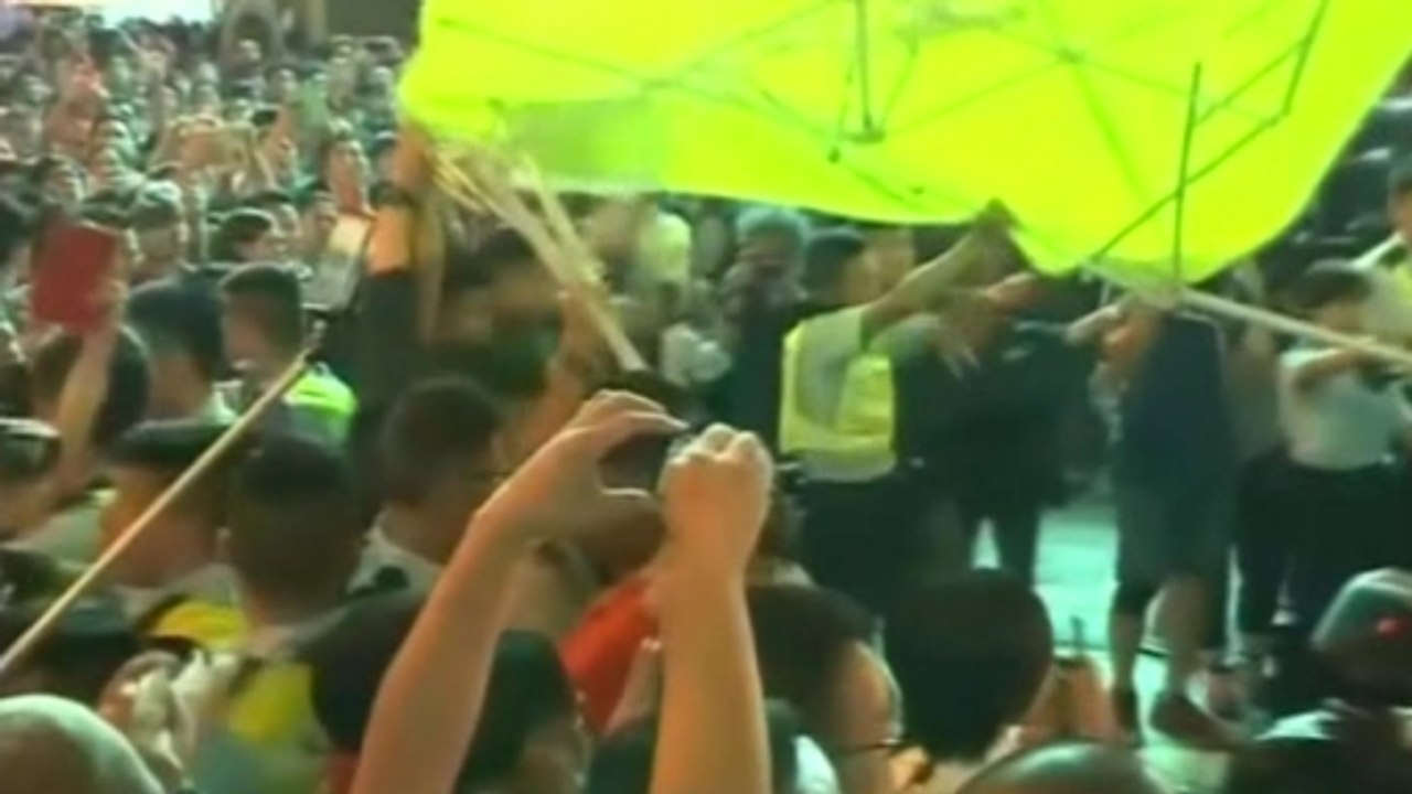 Pro-democracy protesters regroup, clash with police