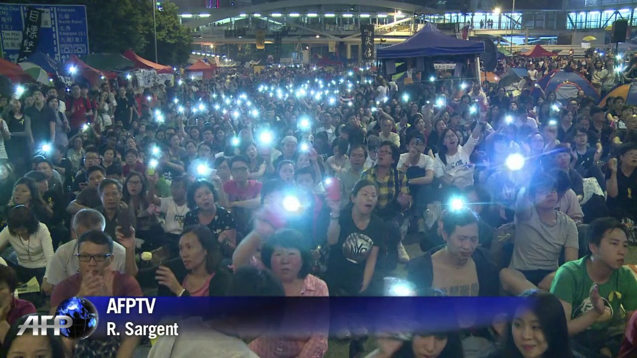 Hong Kong: rassemblement pacifique après trois nuits de heurts