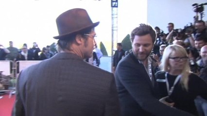Brad Pitt invites war veteran onto red carpet