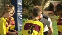 Prince Harry rugby tackles a girl at Eccles RFC