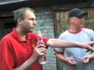 Polish guy drinks a bottle of vodka