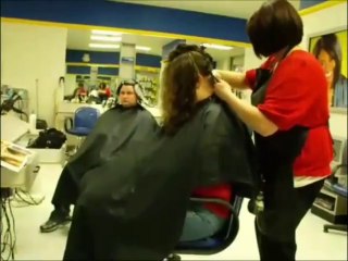 Long hair gets cut into a short bob at the salon