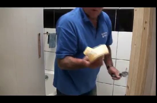 grouting bathroom tiles