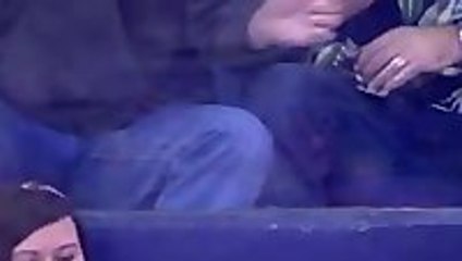 Fan dances to 'Turn down for what' with the team mascot