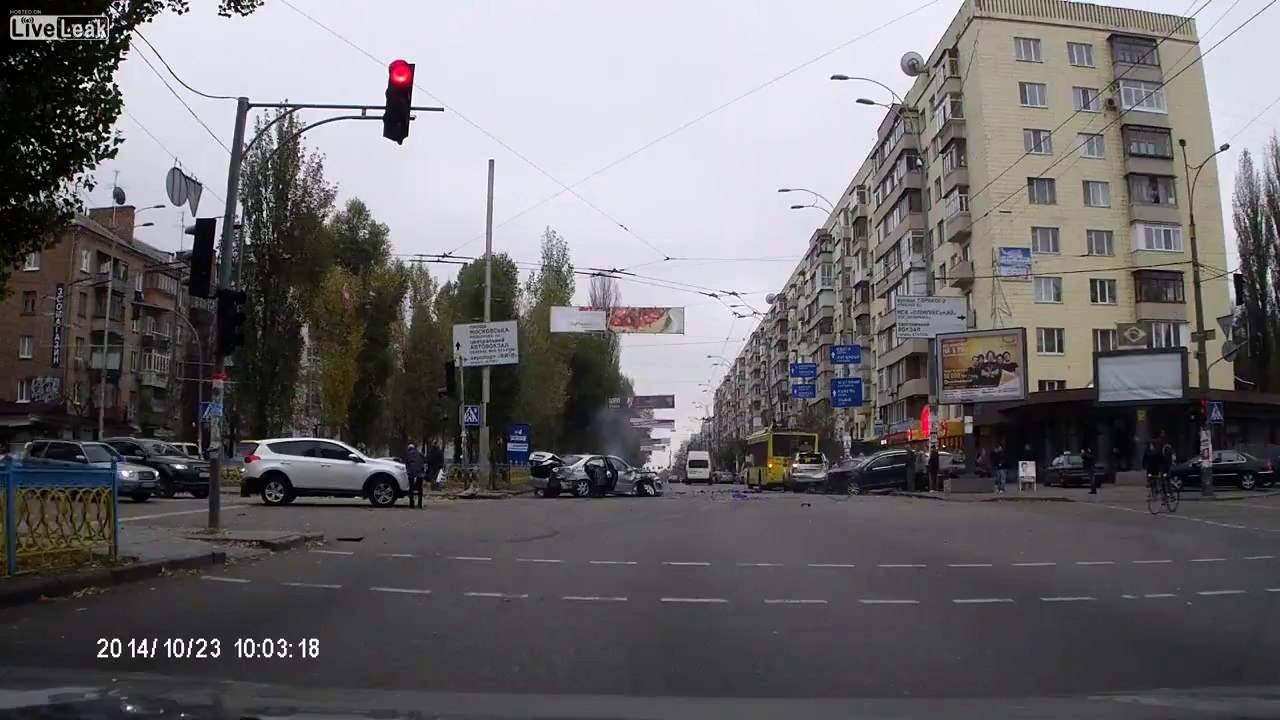 Speeding Red Light Runner Nearly Takes Out Pedestrians