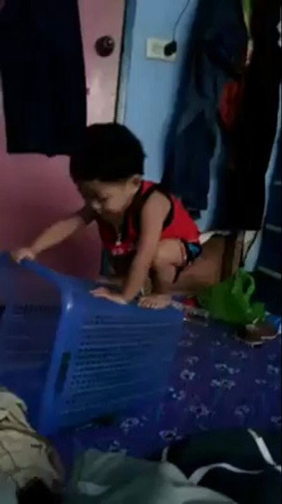 kid in basket
