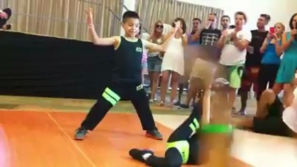 Little girl and boy dancing