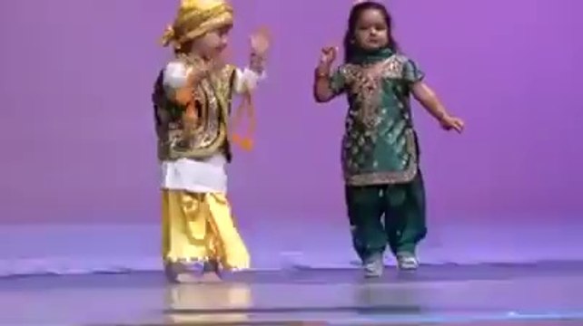 indian young couple are dancing very nice on punjabi song