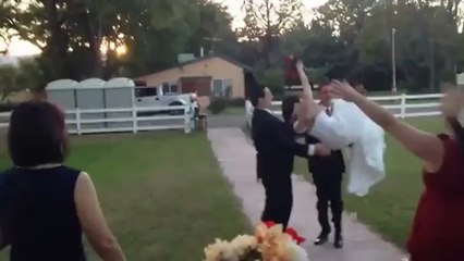 Groom Drops Bride During Their Grand Entrance