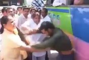 Women Beating Man on Road