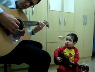 Amazing ! Kids playing guitar