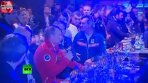 Video- Putin hugs gay athlete, speaks German, drinks beer in Sochi