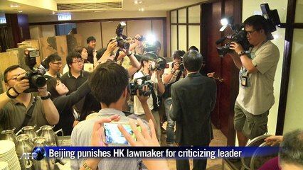 China punishes HK lawmaker for criticising leader
