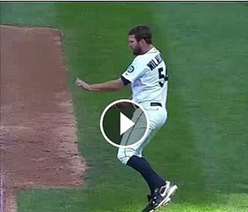 Seattle Mariners pitcher Tom Wilhelmsen on the field dancing