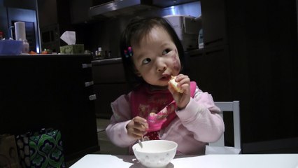 Girl Eating An Orange