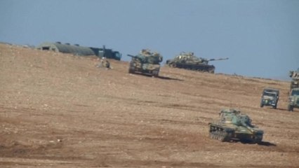 Kurdish peshmerga forces enter Syria's Kobani