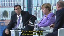 Poutine raconte une blague à Merkel