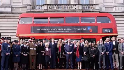 Prince Harry hops on to an old London bus with actress Barbara Windsor to promote Poppy Day