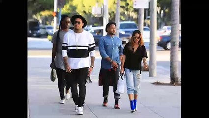 Chris Brown flaunts 24k gold personalised iPhone 6 on outing with Karrueche Tran