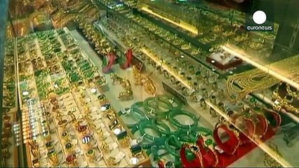 El oro baja de 1.1170 dólares por primera vez en cuatro años