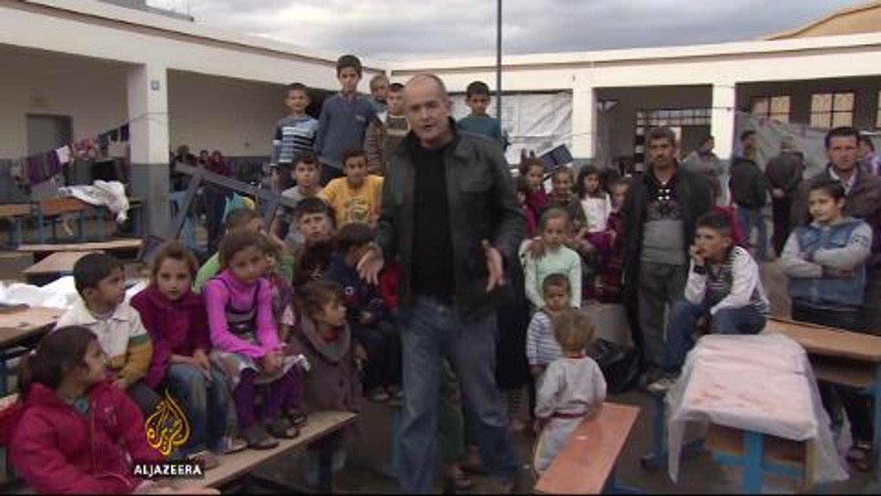 Refugees replace students in Iraq classrooms