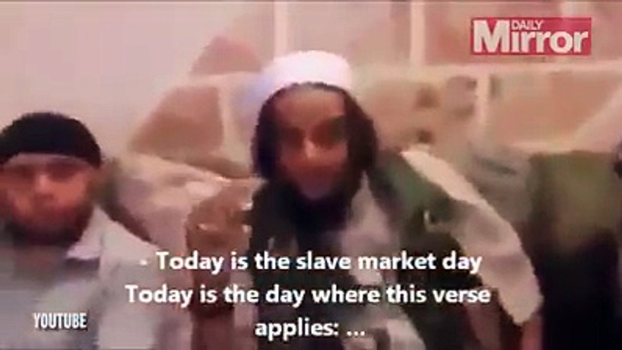 Shocking video shows ISIS fighters bartering for young women at '