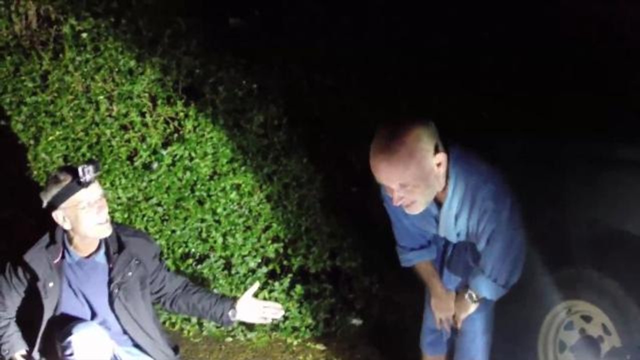 Man in Bathrobe Chooses Helping An Injured Fox Over Watching Football