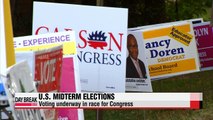 Americans vote in midterm elections viewed as poll on Obama