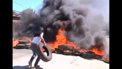 Clashes in Chile as fishermen demand action following oil spill