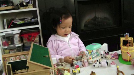 Girl And Sylvanian Families