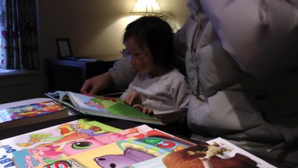Girl Reading Dora The Explorer