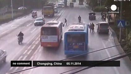 Oblivious pedestrian causes China coach crash