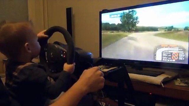 3 years old kid playing at Richard Burns Rally video game like a pro!