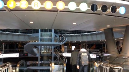 Taking the Fulton Center escalator