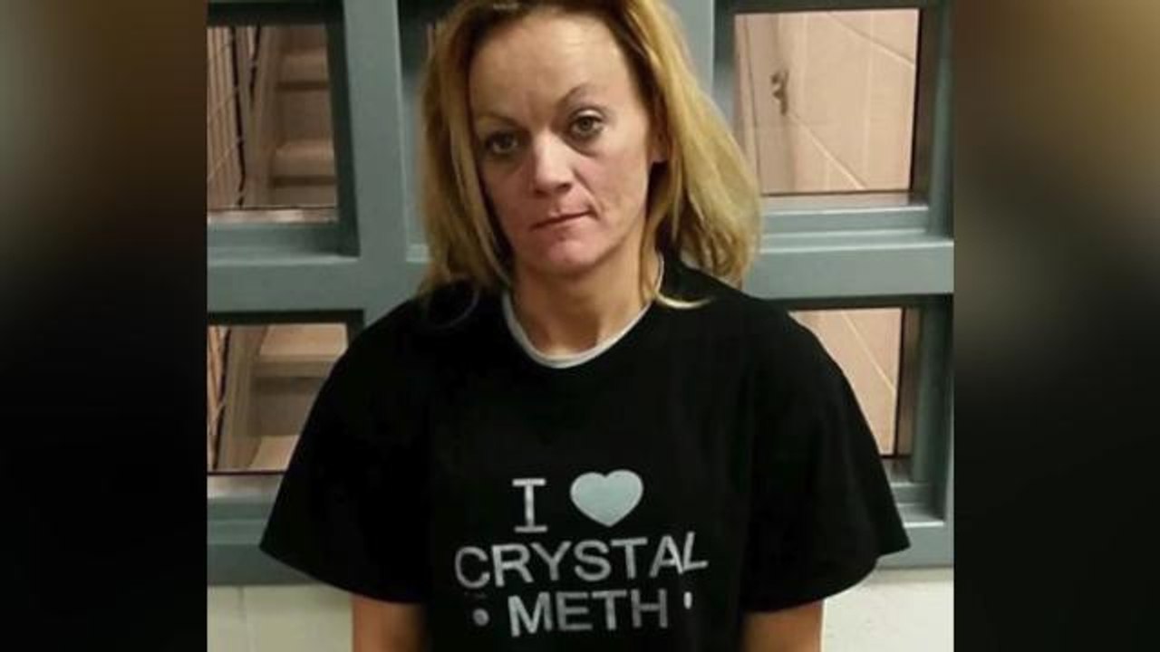 Woman Wearing "I Love Crystal Meth" Shirt Buste...
