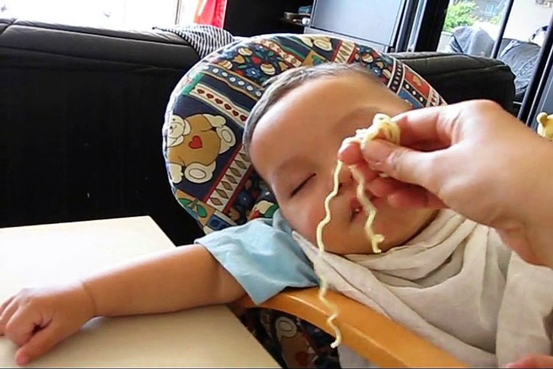 Baby eating while sleeping
