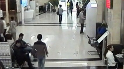 Thief captured on camera swiping money from bank counter